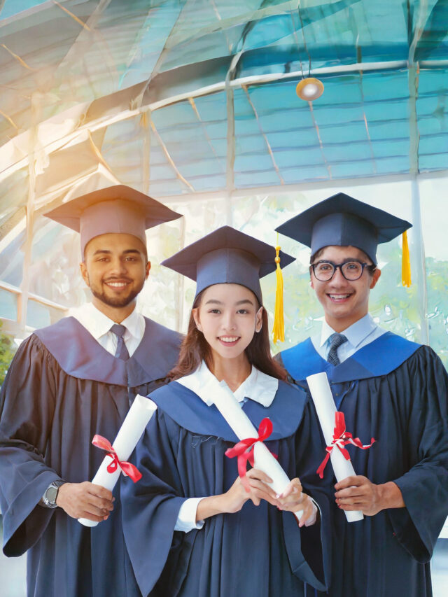 Firefly A group of excited students in graduation gowns holding diplomas, with a science lab in the